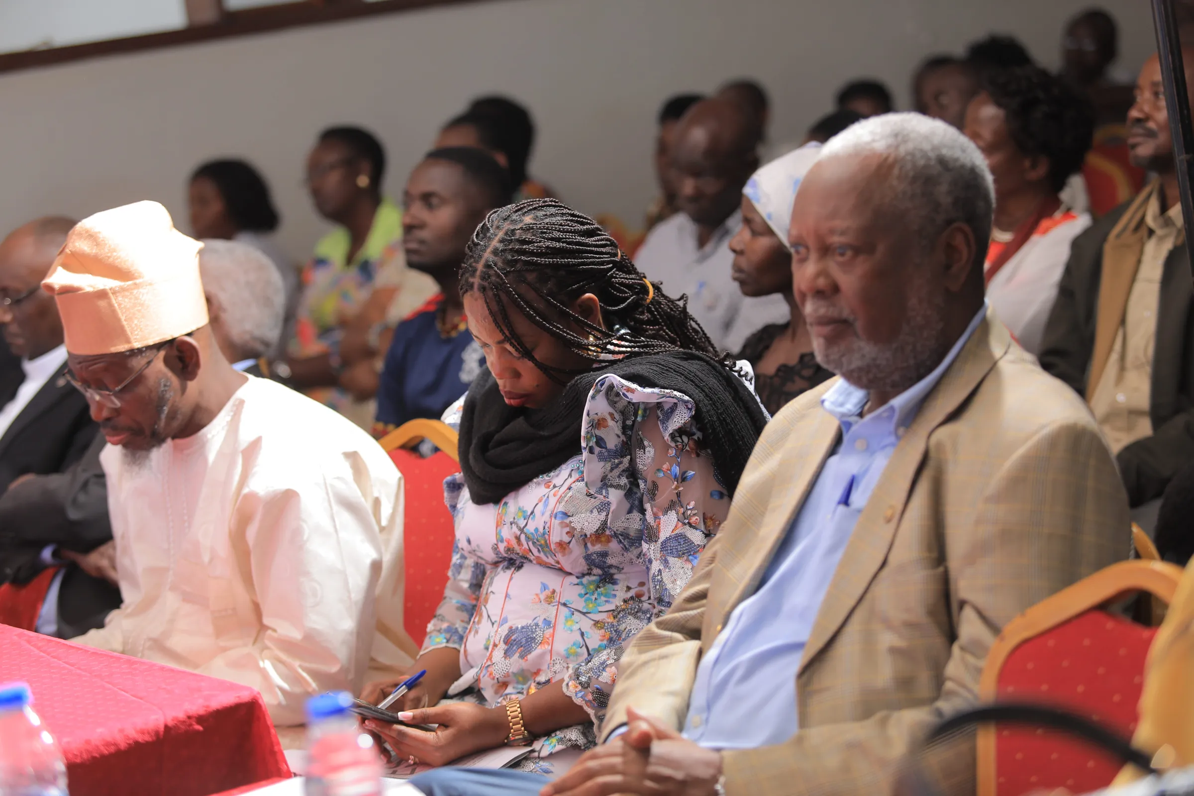 Mentor guiding young entrepreneurs